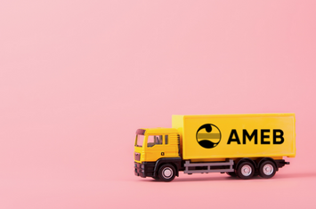 a yellow "AMEB" truck